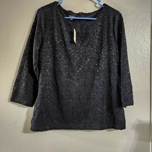 Talbots Top Small Beautiful Black with mesh and a kind of sparkle to it.